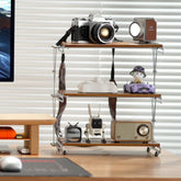 Super Wooden Desk Shelf is staged with a vintage camera, radios, and a toy car on its wooden tiers, placed next to a computer monitor | Cyber Vintage